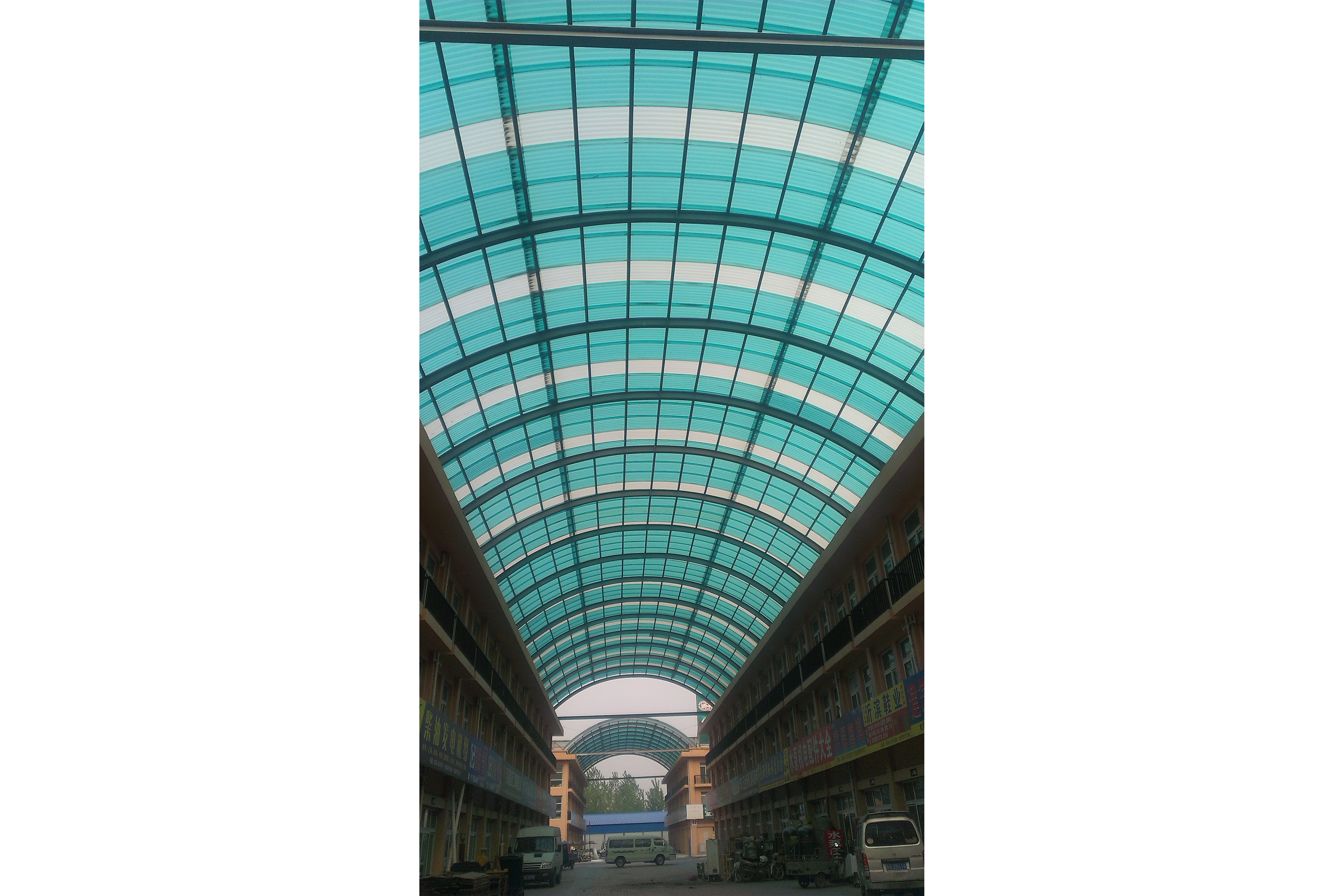 煜阳建材耐力板雨棚应用场景图