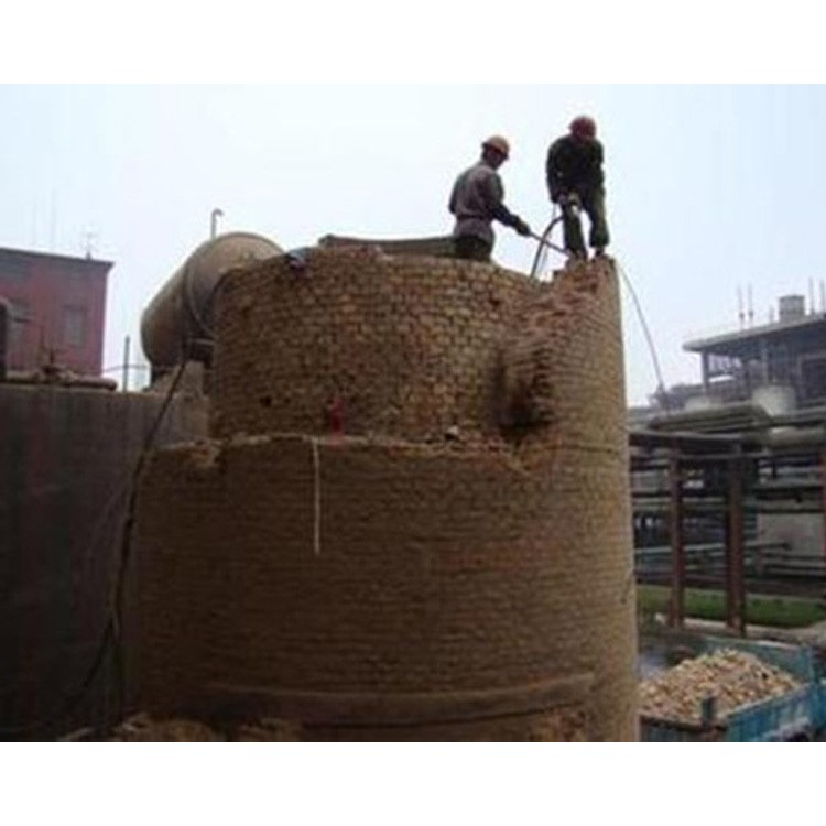 Manual brick chimney demolition