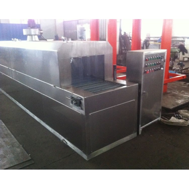 Through-put cleaning machine